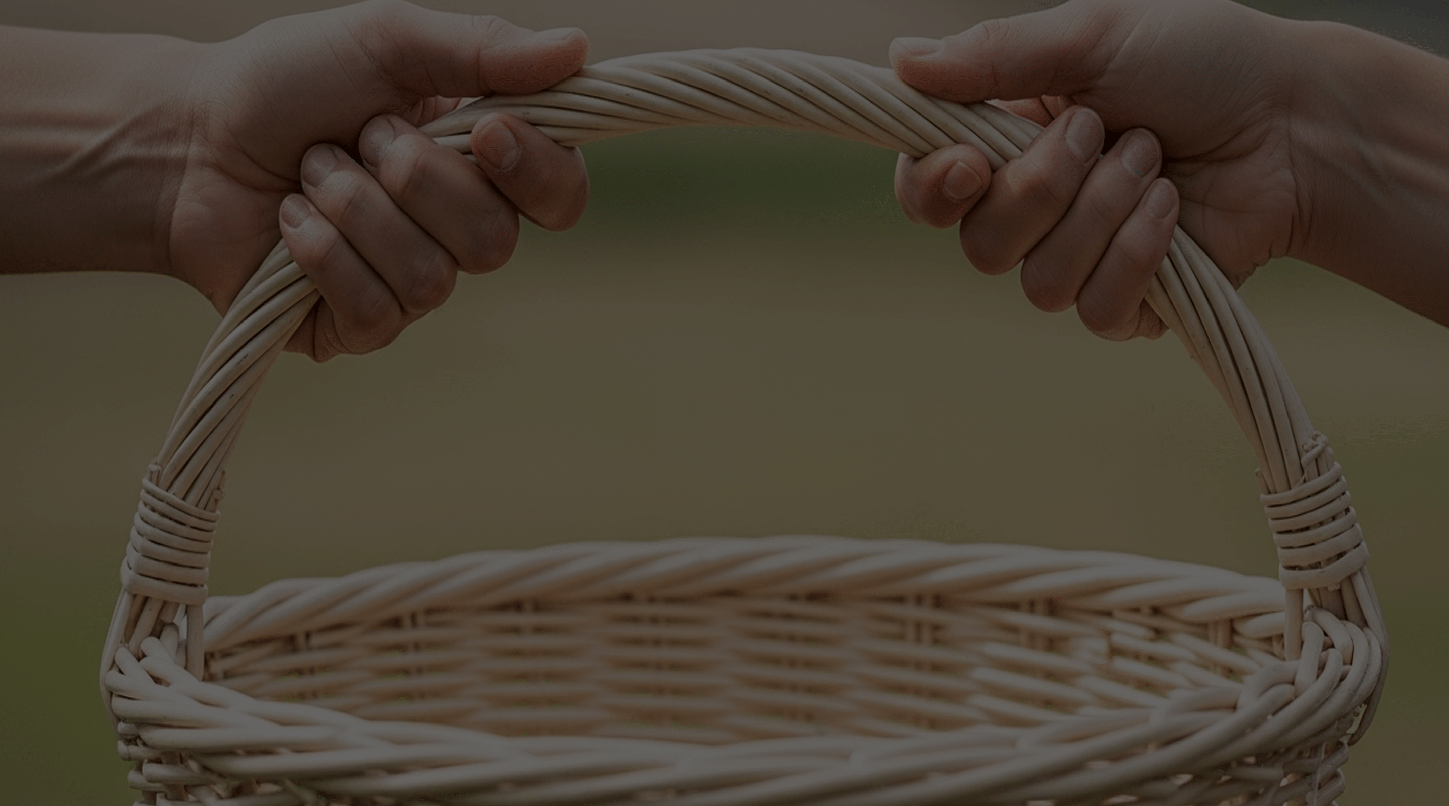 Basket being held by two hands
